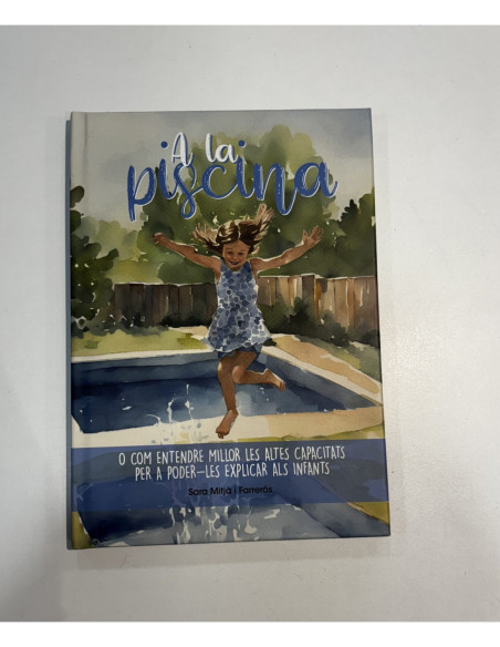 A la piscina
